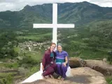 Tina on top of a beautiful mountain in Kerala